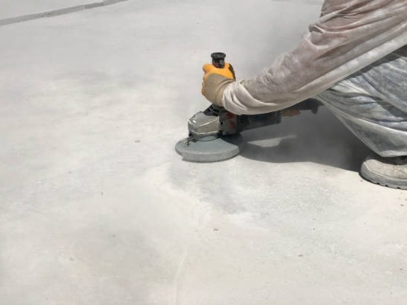 imgi_8_hands-of-worker-grinding-concrete-surface